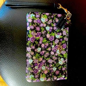 Coach Wristlet black with flowers and purple interior
